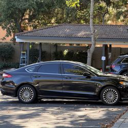 2014 Ford Fusion Hybrid Titanium – 90k miles – Runs Perfect