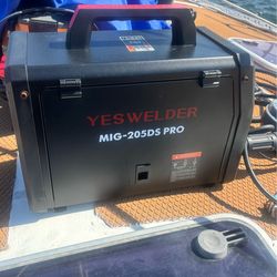 MIG and Stick welder . Used only twice, as new