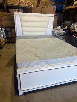 New Queen bed with mattress for $390