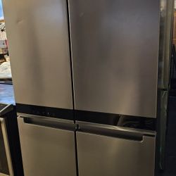 WHIRLPOOL STAINLESS STEEL 4 DOORS REFRIGERATOR...COUNTER DEPTH....WITH ICE MAKER INSIDE....$ 550