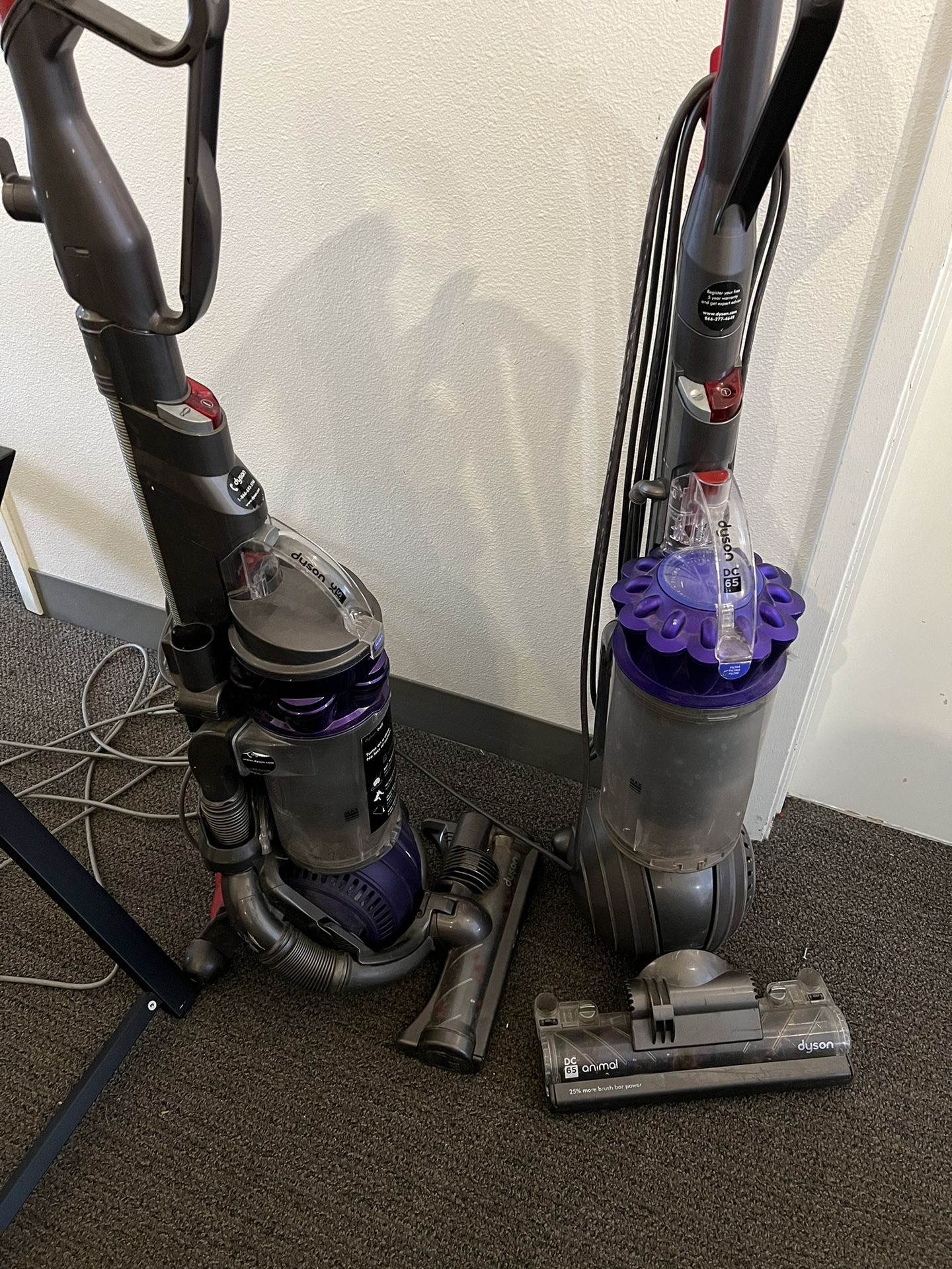Two Dyson Vacuums