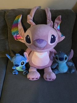 Stitch Plushies. Pink One Is 18 Inches And 2 Blue Are 8 Inches