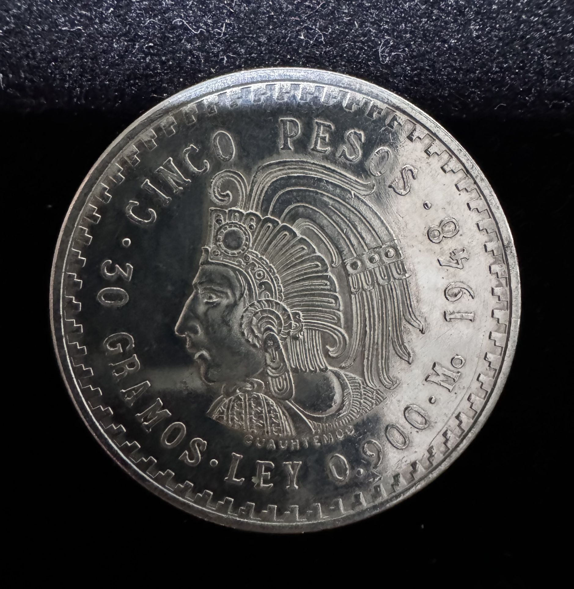 1948 .900 silver, Mexico 5 Paso coin.