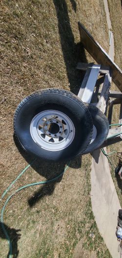 265 75 16 Pair Of Perless Tires & White Spoke Rims
