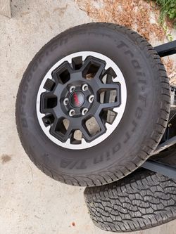Set of 4 TRD off road wheels and tires with tpms