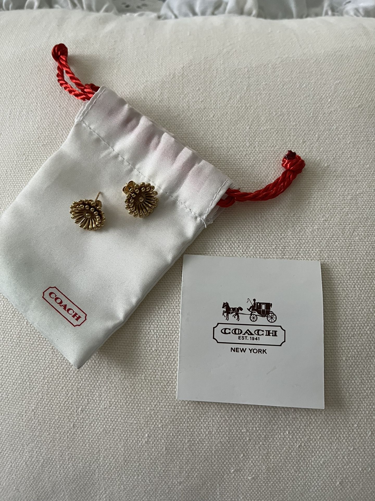 Coach Gold tone Flower Stud Earrings