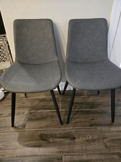 Two Faux Leather Dining Chairs