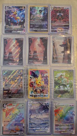 Pokemon cards charizard,  pikachu,  charmander etc.