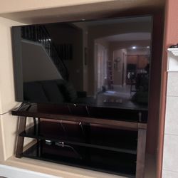 LG 65” TV with Wood & Glass Stand