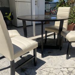 Dining room table with chairs