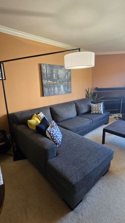 HUGE Sectional sofa - 18 ft x 8ft - with decorative pillows.