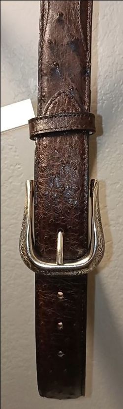 Brand new with tags Cody James Black 1978 Genuine Ostrich Belt. Retail price is $169. Only asking $60. Size 36. Got as gift and needed different size.