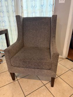 Gray Upholstered Wingback Accent Chair