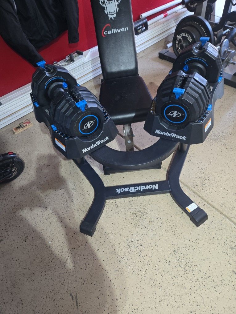 Nordictrack  Dumbbells Set With Stand And Bench Included. 55 Pounds Each Adjustable  Like New
