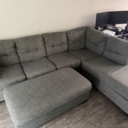 Grey L shaped Sleeper bed couch