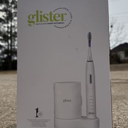 Glister™ Multi-Action Power Toothbrush NEW Sealed In Box