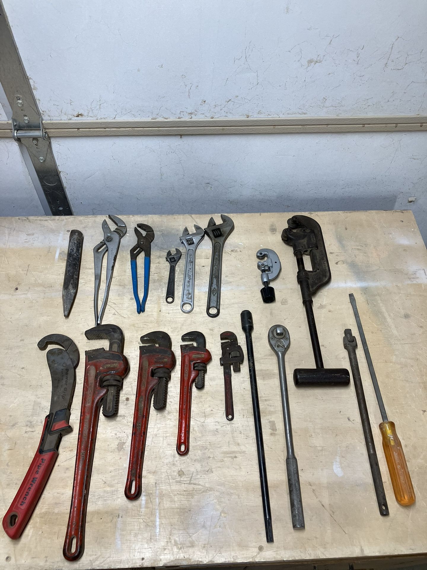 Tools: Set Of Wrenches, Channel Locks, Pipe Cutters, And Misc.