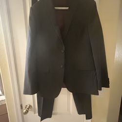 Size 18 young man’s charcoal, gray suit