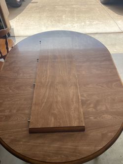 Medium size dining table with four chairs