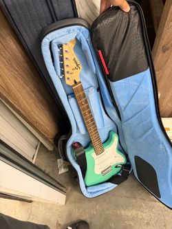 Squier Sonic Stratocaster in Surf Green, Gator Case
