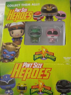 Photo Two Funko Pop mini power ranger and cased collectible figurines - toys - TV - series - game