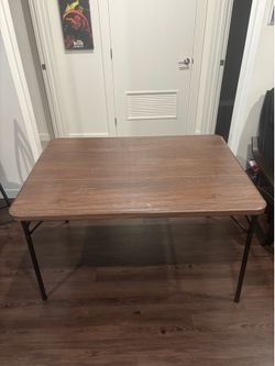 Dark brown foldable cardboard table