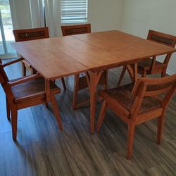 Table And Five Chairs