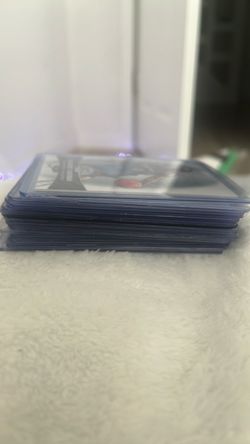 Stack of Trading Cards in Sleeves