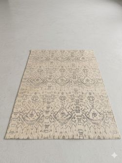 Reversible padded baby rug 55” x 82”.  Perfect condition!
