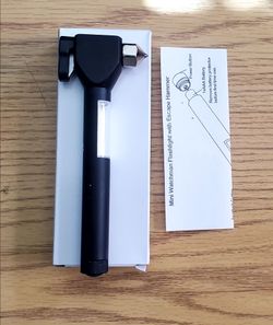 New and never used Mini Watchman Flashlight with Escape Hammer