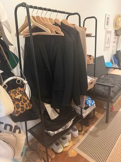 Portable black metal frame wardrobe with 3 shelves