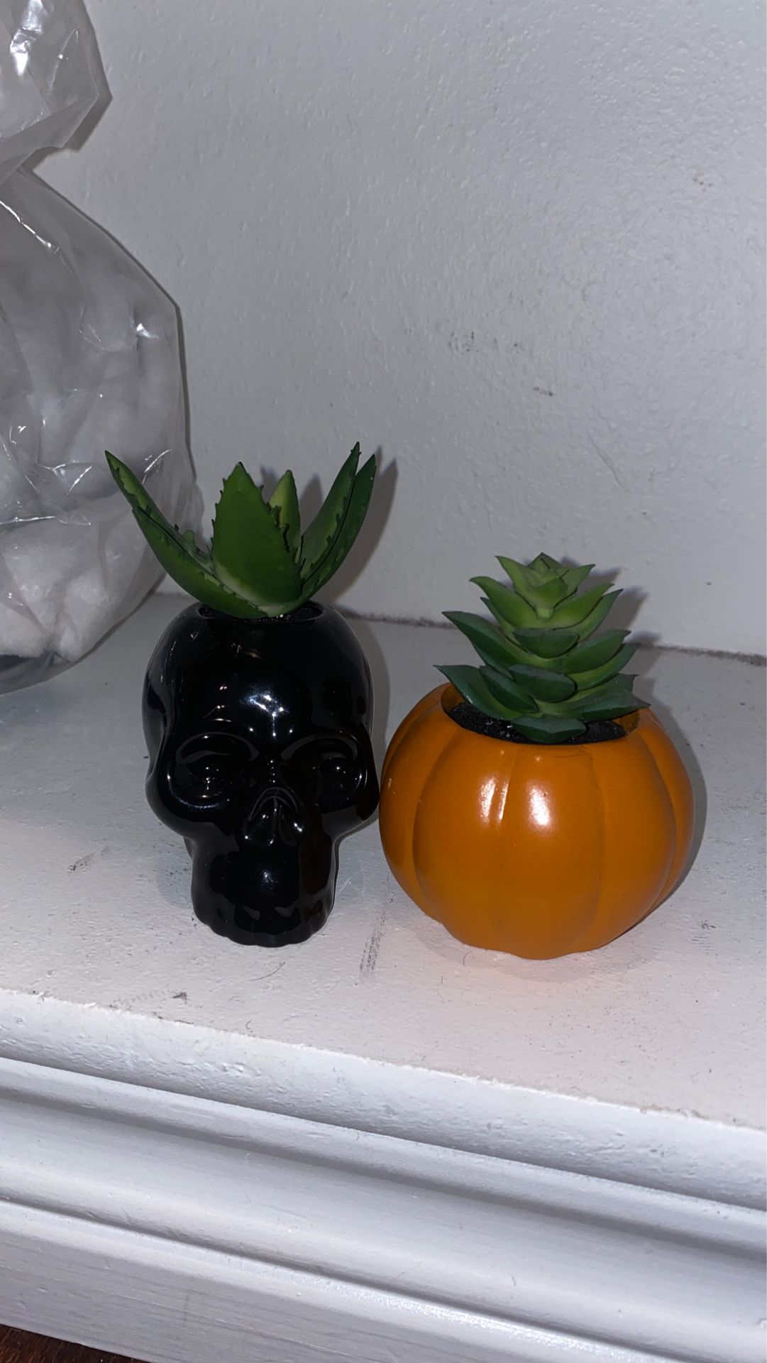 black skull succulent holder // orange pumpkin succulent holder // fake plant // succulent decor // skull