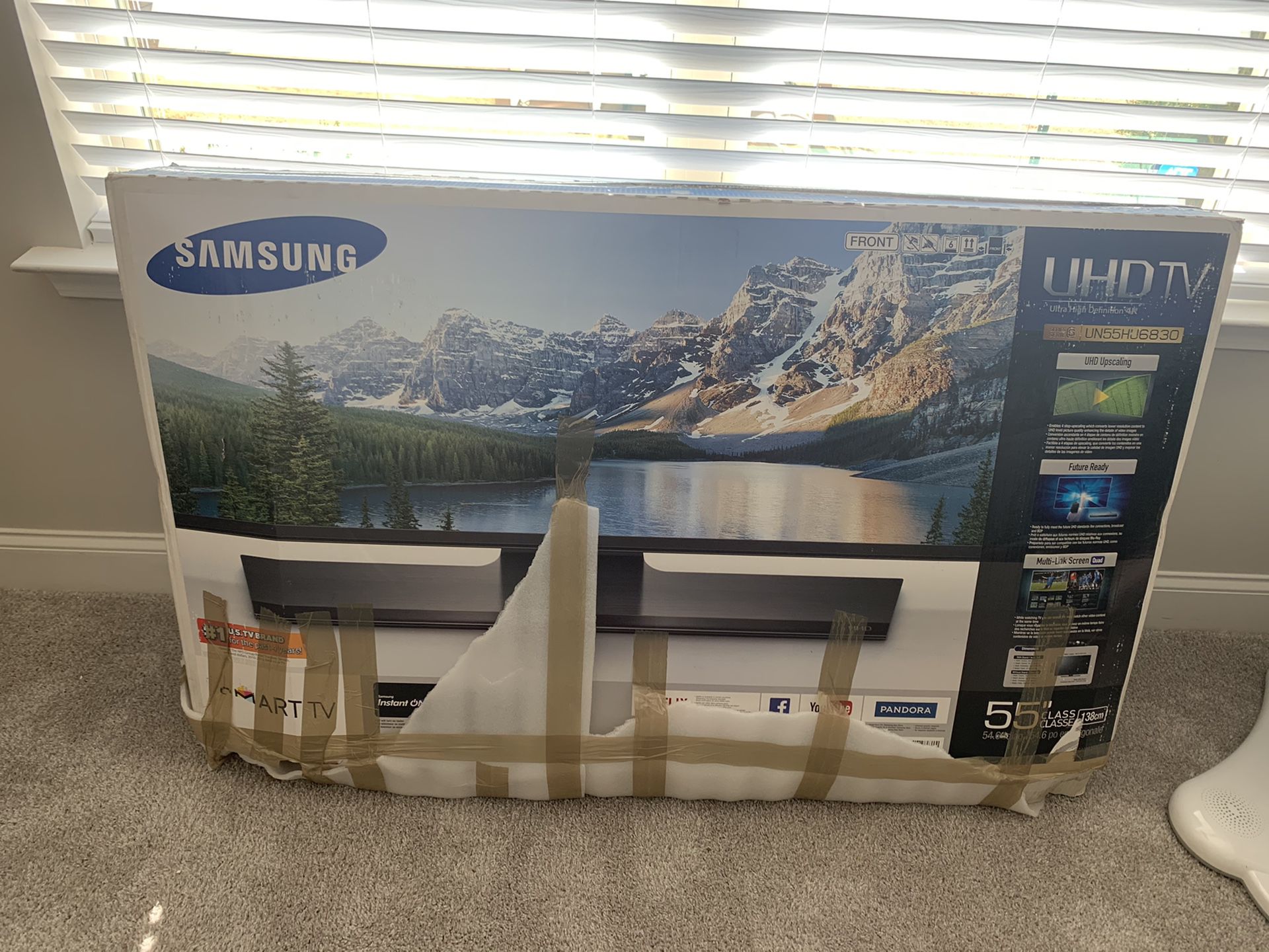 55 inch Toshiba TV - wrapped in box $50 needs to go ASAP - free area rugs to go with and tv stand