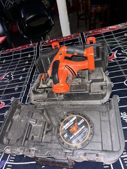 Battery Powered Saw & Pair Of Tire Boots 