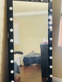 black impressions mirror