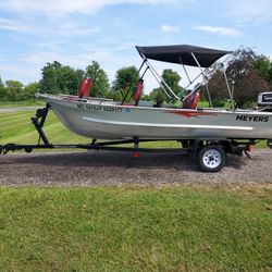 1977 Meyers Aluminum fishing boat,4 new seats  , new decals, no leaks, new Bini top, new cover, new steering cable, carpet, , new boat light bow and s
