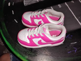 Toddler girl pink and white Nike shoes 7.5