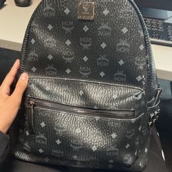 black mcm backpack