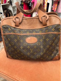 Vintage Louis Vuitton carry on Luggage