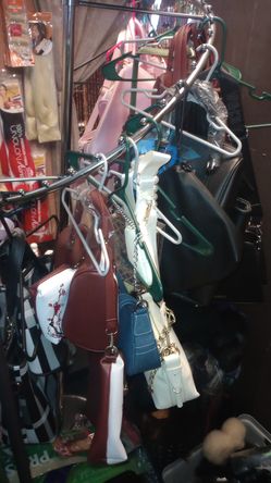 Clothes and purses for sale