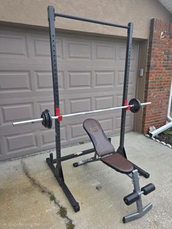 Half Rack, barbell, bench and weight