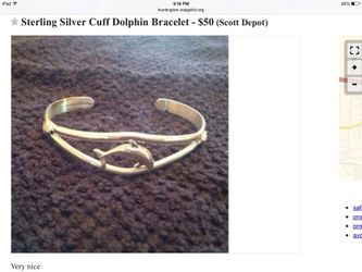 Sterling silver dolphin cuff bracelet.