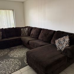 Ashley’s Brown Sectional Sofa For living Room.