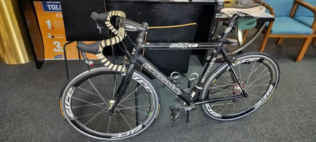 Cannondale Six13 hand made carbon fiber and aluminum bike with upgraded Zipp Wheels