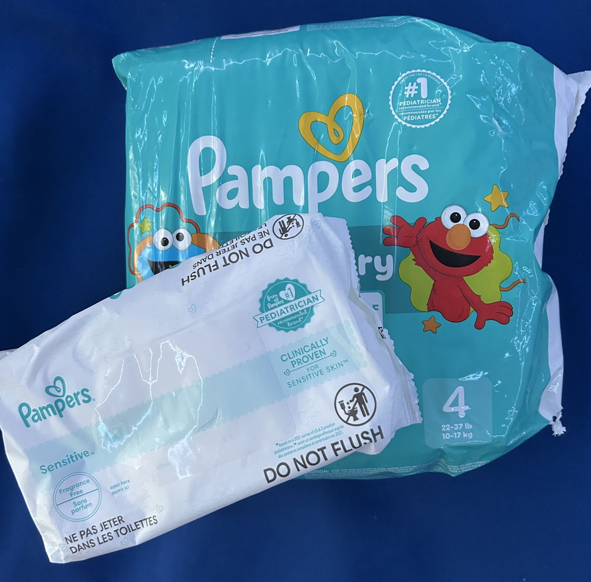 Diapers 4 And Bag Of Wipes