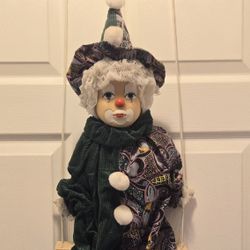 VINTAGE PORCELAIN CLOWN DOLL ON SWING