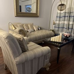 For sale in excellent condition: a complete living room set, including a sofa with side chair, two side tables with glass tops and gold bases, two lam