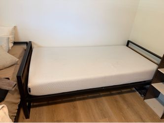 Two twin beds with trundles and twin mattresses