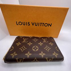 Pre-Owned Louis Vuitton Zippy Compact Wallet 