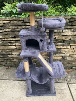 Cat Tower tree condo Activity Center with scratching posts to keep kitty cozy and entertained- as is - priced cheap- might need a little tweak